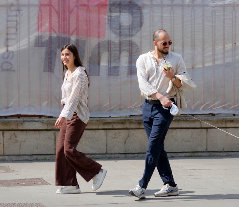 Young couple on sidewalk